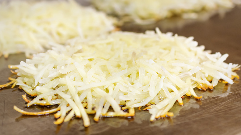 Hash browns on a griddle