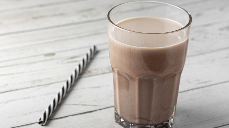 glass of chocolate milk with straw