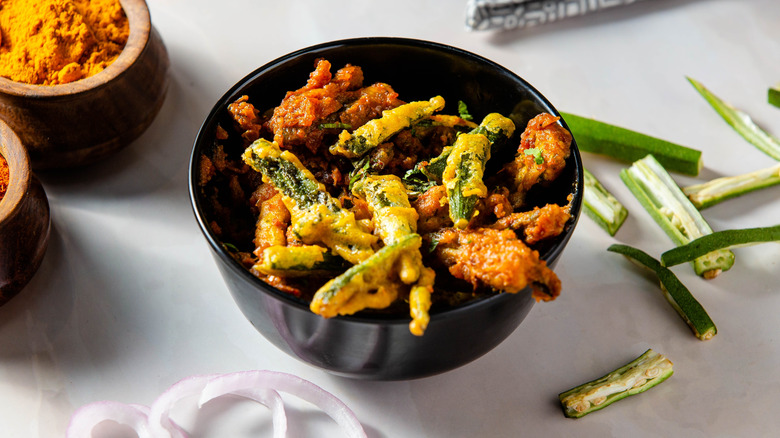 Fried okra with raw ingredients