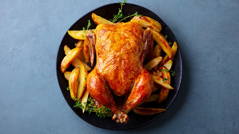 Roast chicken on platter