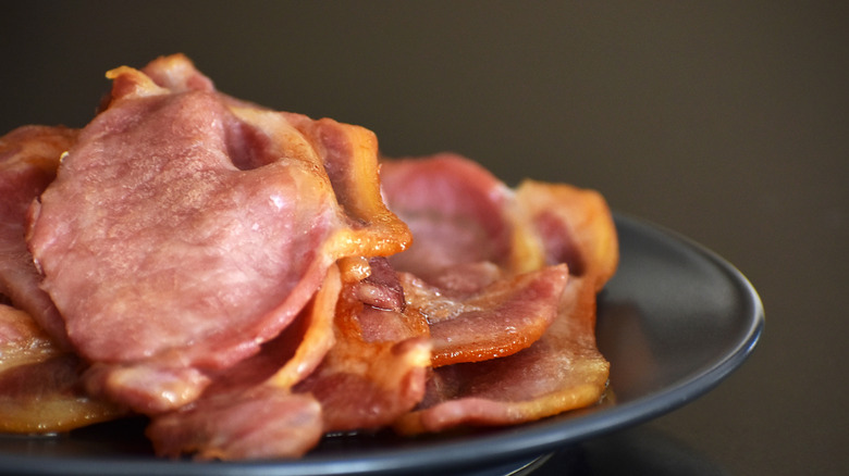 A plate of cooked back bacon