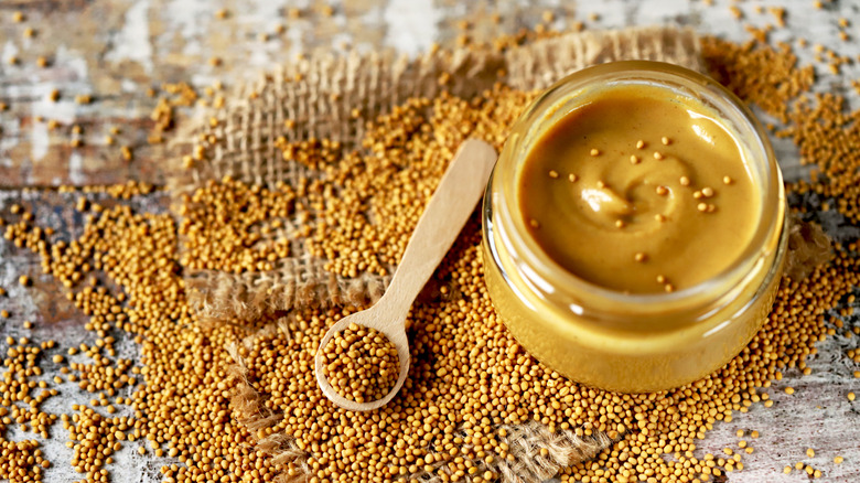 Jar of mustard with seeds