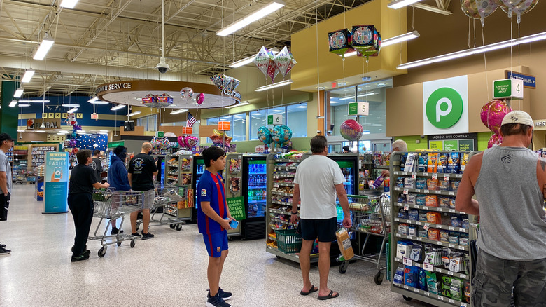 Customers lined up to check out at a Publix supermarket.