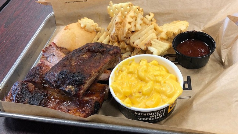 Barbecue ribs with waffle fries and mac and cheese at Dickey's BBQ Pit