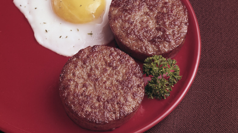 breakfast sausage patty and eggs