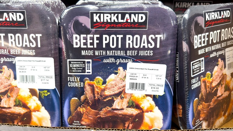 Closeup of three packages of Costco Kirkland Signature's Beef Pot Roast in store