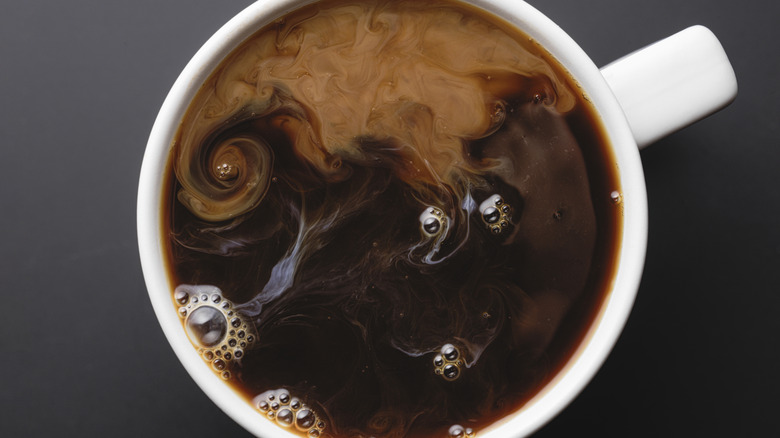 A cup of coffee with cream