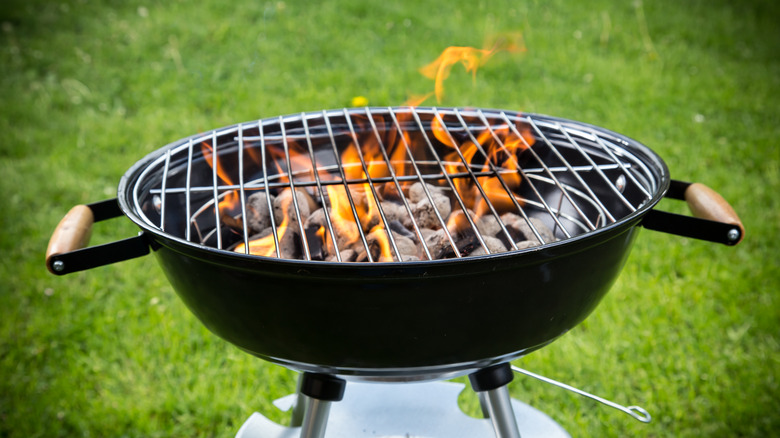 Backyard bbq with burning coals