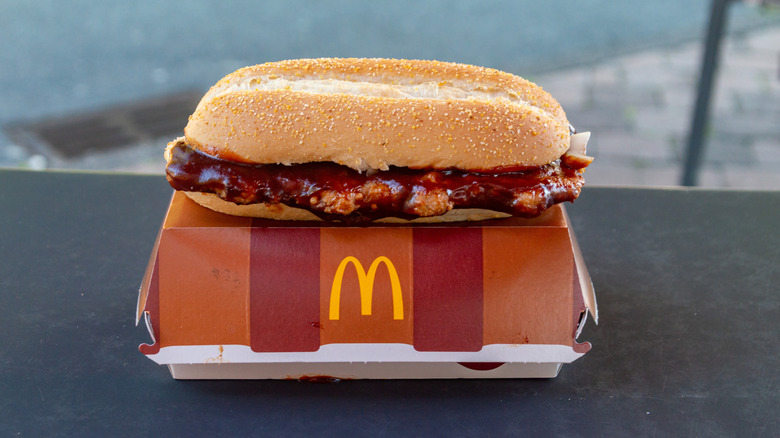 McRib sandwich sitting on top of its box