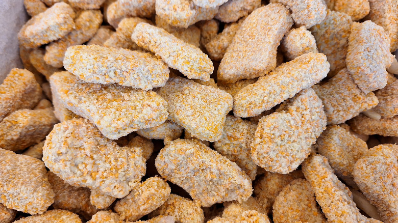 A pile of frozen chicken nuggets.