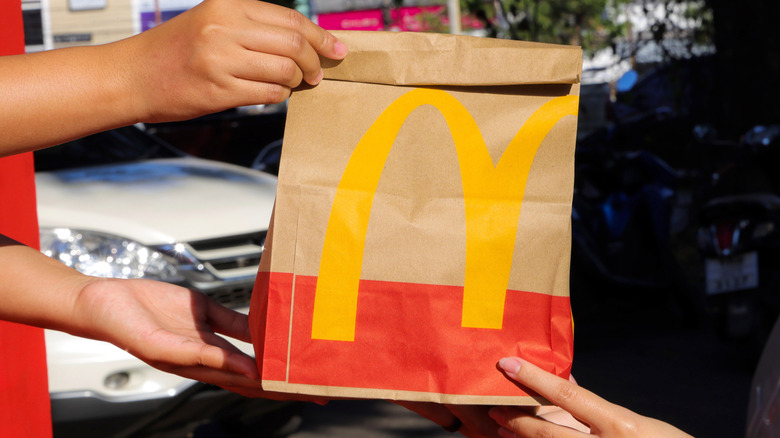 Handover of McDonald's bag