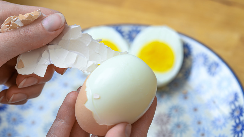 Peeling a hard boiled egg