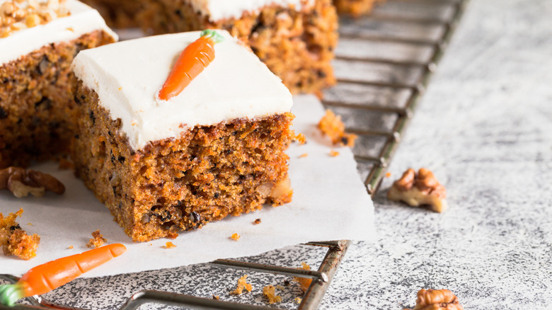 Square slice of carrot cake with walnuts
