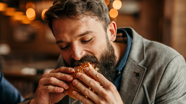 Man eating burger 