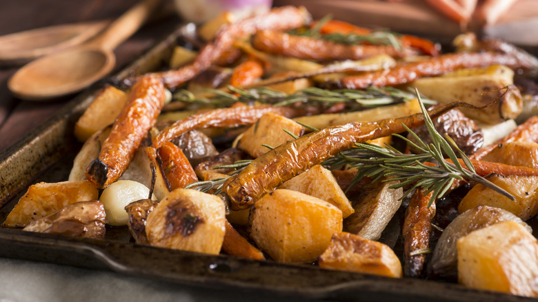 Roasted root vegetables on baking sheet