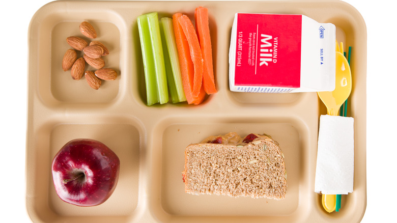 school lunch tray with milk