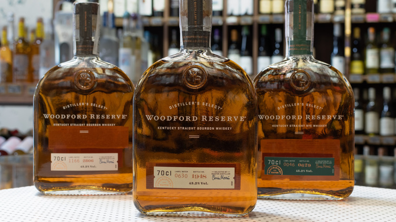 Three bottles of Woodford Reserve bourbon