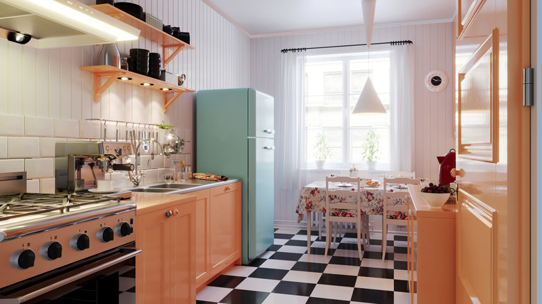 A vintage styled kitchen has "dumb" appliances.