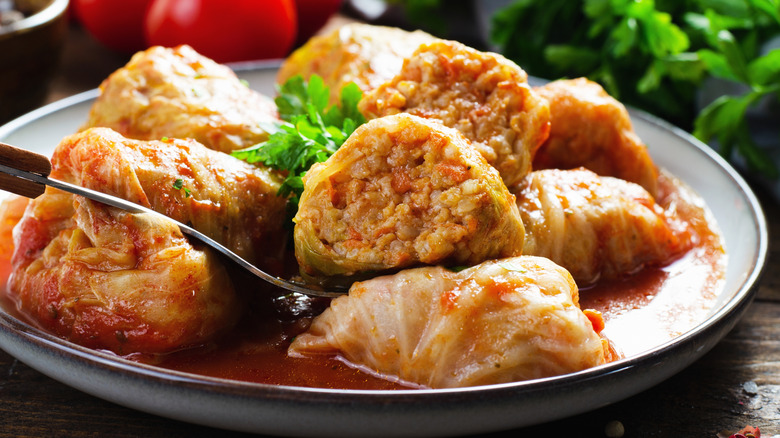 A plate full of stuffed cabbage rolls