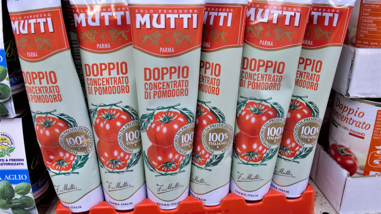 Tubes of Mutti tomato paste in grocery store
