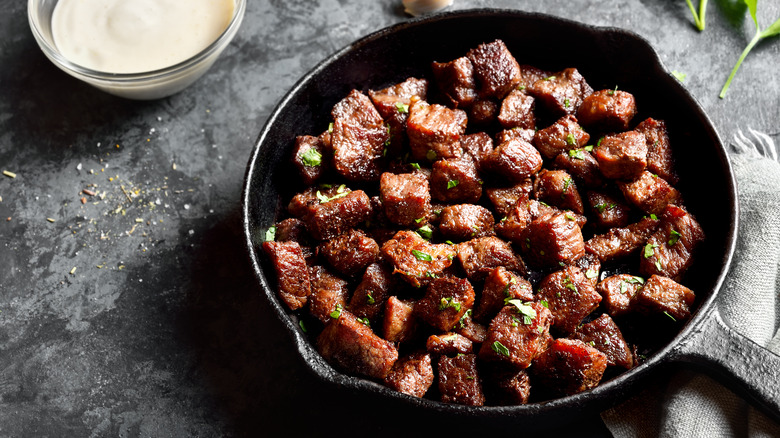 Steak bits in pan