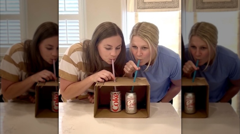 Two people doing a blind taste test of Diet Coke versus Summit Diet Cola