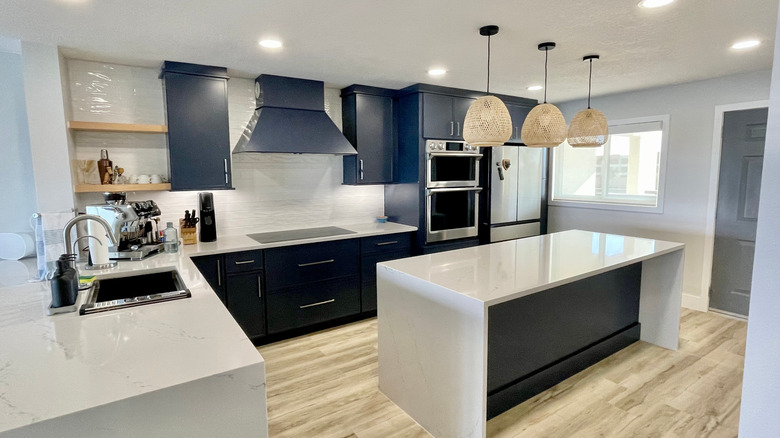 A kitchen with too many overhead lights looks uninviting.