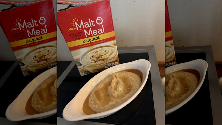 Malt-O-Meal box on table with bowl of prepared cereal next to it