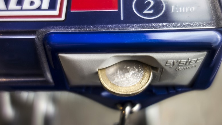 Aldi shopping cart with coin in slot