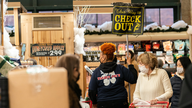 Trader Joe's customers lining up for checkout.