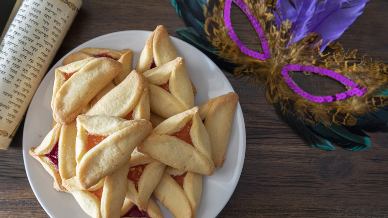 Hamantaschen next to a mask