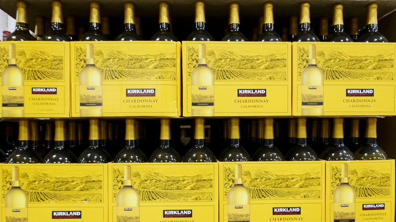 Cases of Kirkland Signature Chardonnay on Costco shelves.