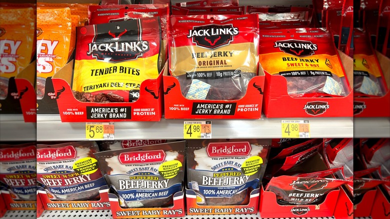 Packs of beef jerky on a store shelf