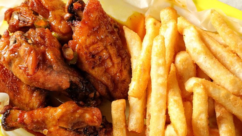 Chicken wings and fries