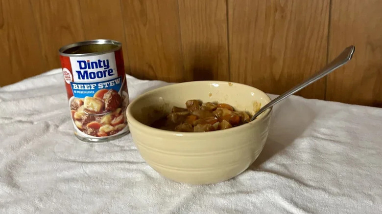 bowl of Dinty Moore canned beef stew with the can
