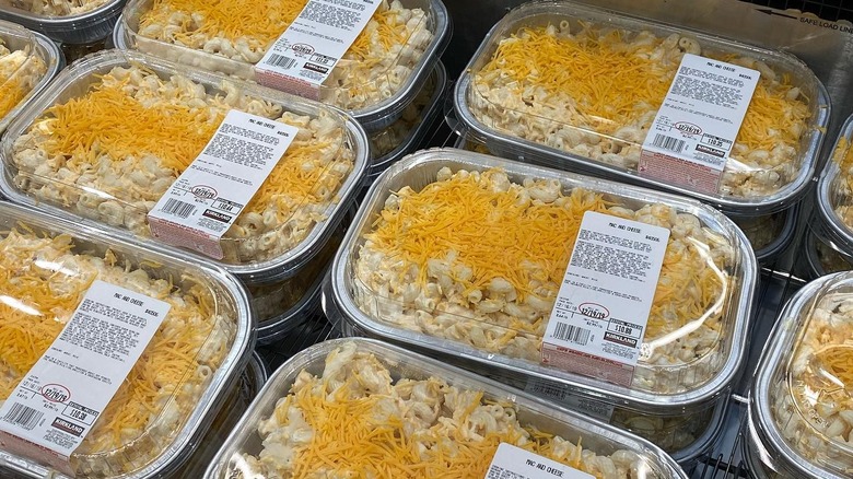 stacks of trays of refrigerated Kirkland Signature mac and cheese