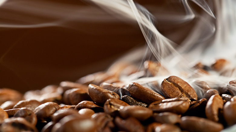 Steaming, fuming batch of fresh coffee beans