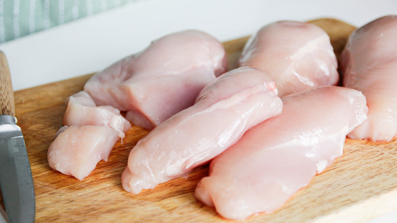 Chicken breasts on a cutting board