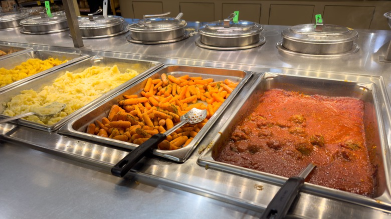 Whole Foods' hot bar trays of food and soups