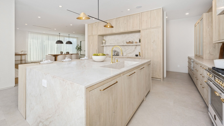 A modern neutral kitchen in white and beige