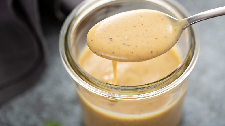 a spoonful of jarred honey mustard sauce