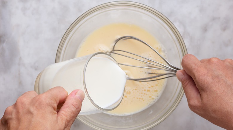 whisking ingredient into pancake batter