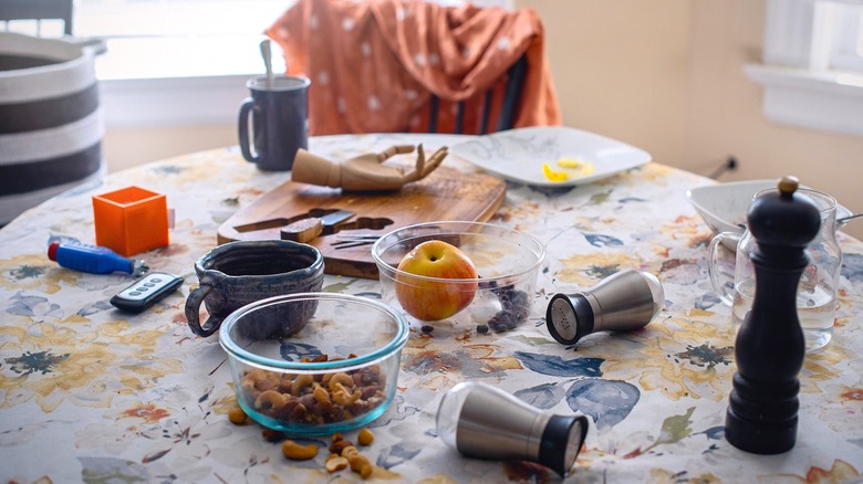 A cluttered kitchen table