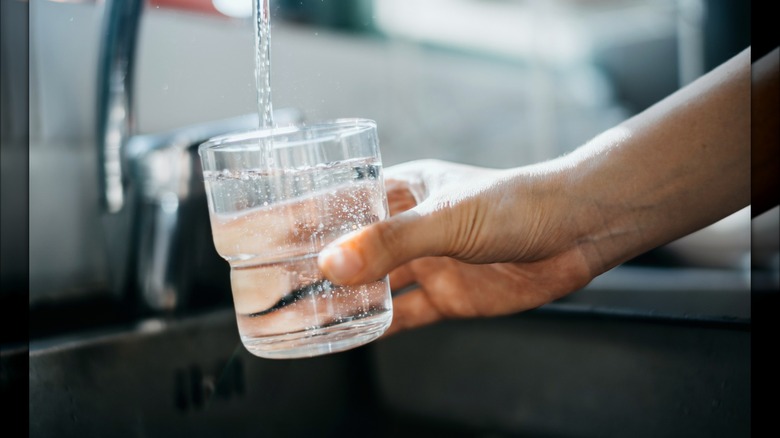 Pouring a glass of water