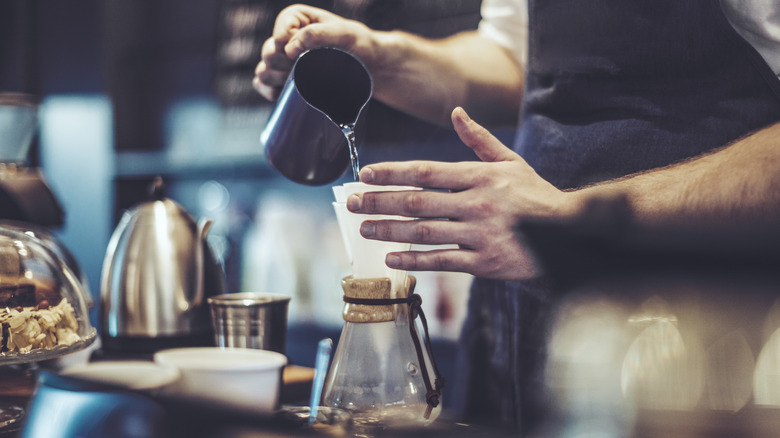 Barista making coffee