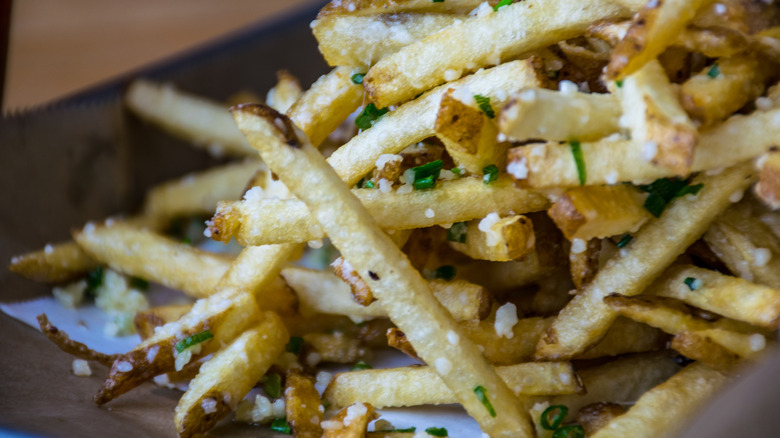 A pile of "truffle" fries in close up, which are usually flavored with synthetic oil.
