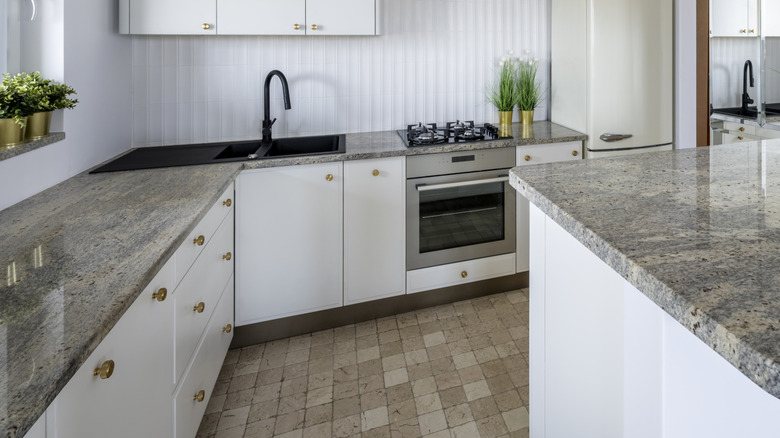 Kitchen photo of stone counter tops with different edging styles