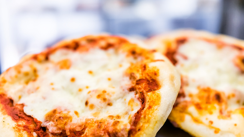 Mini cheese pizzas close up