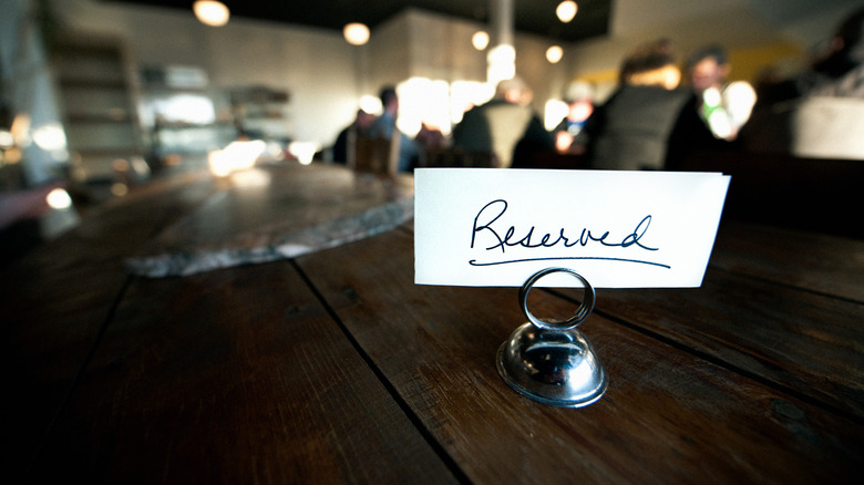 A reserved sign on a table