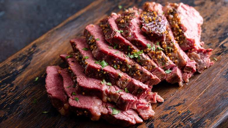 Corned beef sliced on a cutting board